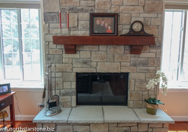 After - Two story stone veneer fireplace in Grayslake