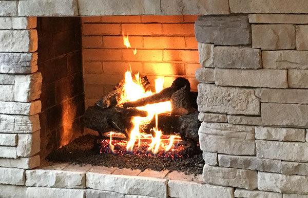 Home with a stone veneer fireplace
