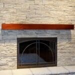 Narrow Profile Stone style with wooden mantel